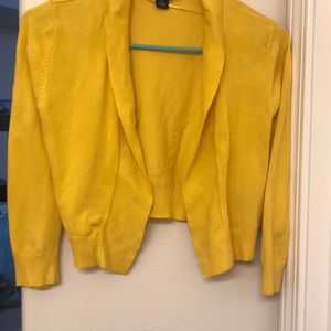 Medium yellow cropped cardigan.